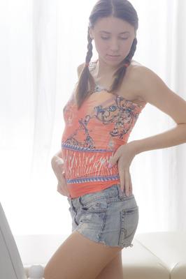 16P Leggy girl Lesya sports braided pigtails while a masseur claims her virginity