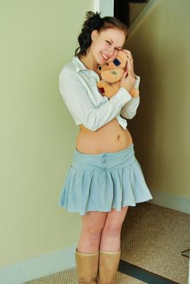 12P Amateur girl Emily exposes her tits and twat while holding a teddy bear