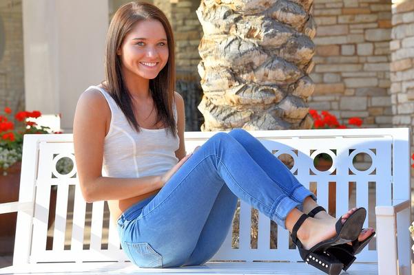 15P Cute girl Zoe pulls down her jeans prior to dildoing her asshole in heels