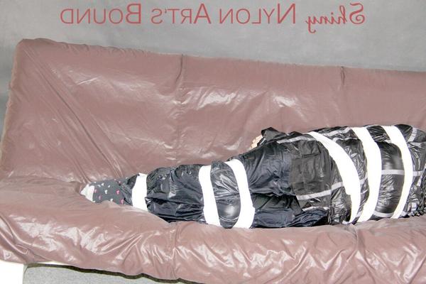 16P Mara wearing a sexy shiny black rian pants and a sexy shiny black rain jacket