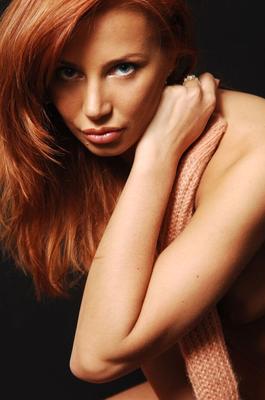 16P Sexy redhead Lova divests herself of clothing to get totally naked