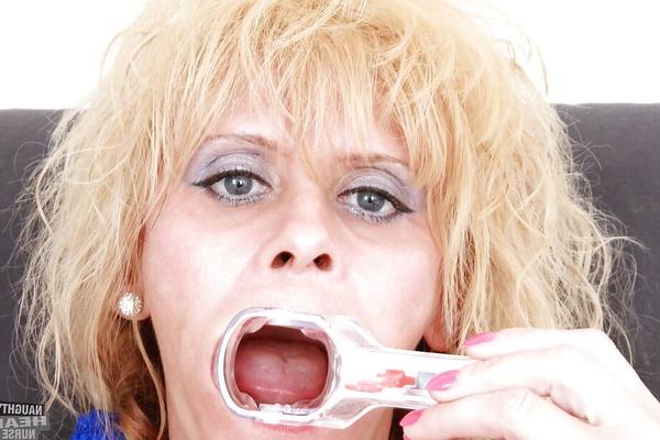 16P Sassy mature nurse stuffing her twat with a vibrator and gyno tools