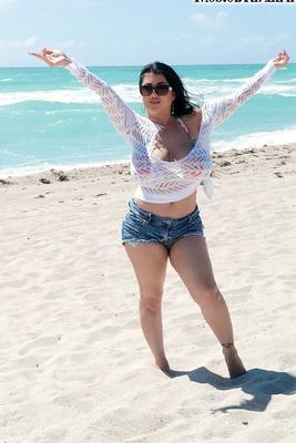 16P Latina female Daylene Rio releases her massive tits from bikini top