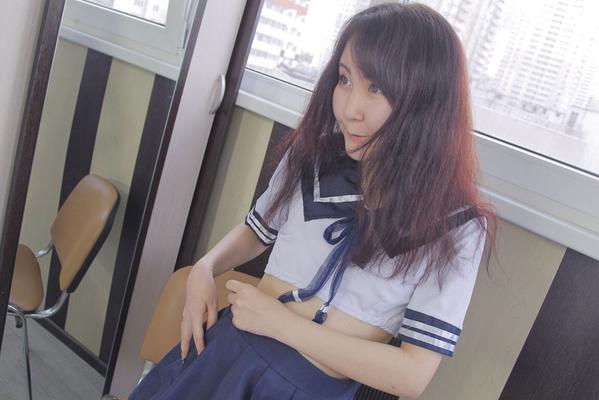 20P Japanese amateur Akuma Loli reveals her tattoos while on dressing by a mirror