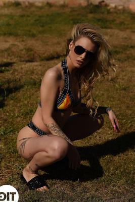 21P British blonde with tattoos Saskia Valentine shows her natural boobs outdoors