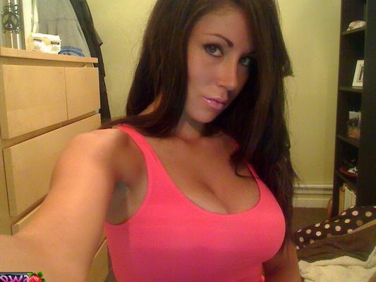 12P Krissys big juicy tits can barely fit in her bra as she opens her trench coat