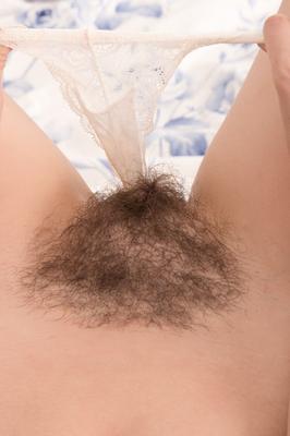 21P Brunette wife Kate Anne reveals her bushy vagina and poses on a bed