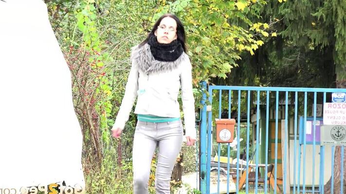 15P Clothed chick AngelAngel pulls down her pants for a piss on a public pathway