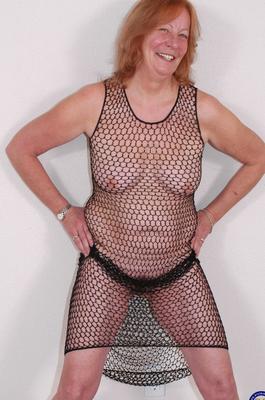 21P Mature ginger Jacky poses in body stocking and gives lovely POV blowjob