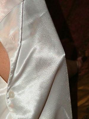 19P Blonde nan Adonna toys her pierced pussy on a bed in a robe and stockings