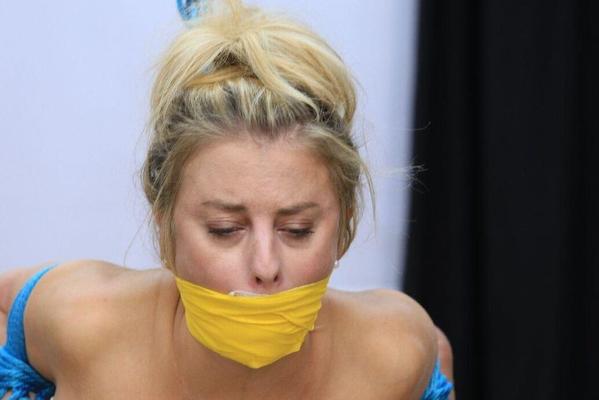 16P Big titted blonde is gagged before being stripped and tied up with rope