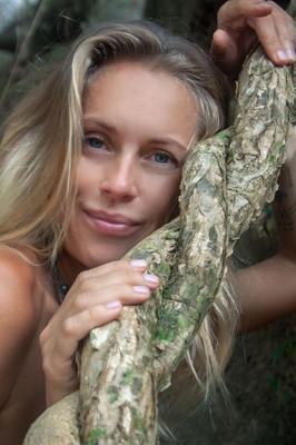 16P Natural blonde Gretel gets totally naked while standing in the water
