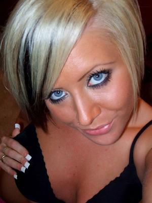 12P Blue-eyed blonde takes tempting self shots on carpeted flooring