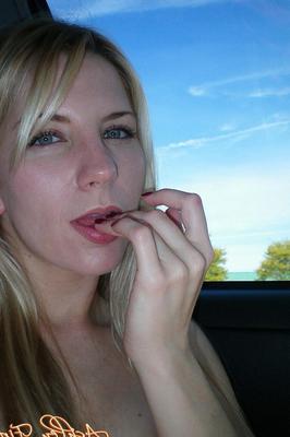 17P Saucy blonde slut Ashley Fires gives head in the car & fingers her vagina