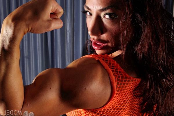 21P Brunette bodybuilder Brandi Mae flexing her big muscles and her big boobs