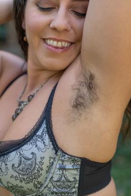 21P Hot amateur Nikki Silver unveils her hairy armpits and twat in the back yard