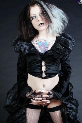 15P Goth girl Mad Sophie sports the Vampire look while exposing herself