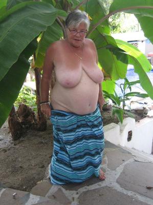 20P Old woman Girdle Goddess smokes before exposing her fat body on her patio