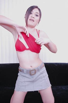 16P Smiley asian babe Ruby Luxe undressing and posing nude on the couch