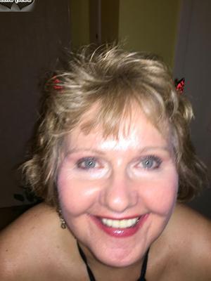 16P Older amateur Busty Bliss teases her lover in black attire and stockings