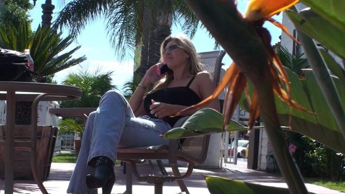 17P Big boobed blonde Jezebel Jones in tight jeans takes a phone sex call outdoors