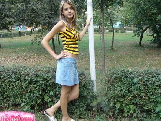 15P Cute teen exposes her tits outdoors during no panty upskirt action