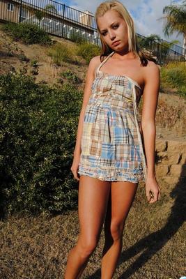12P Slim blonde teen Codie Sweets makes her nude debut on a bank below her house