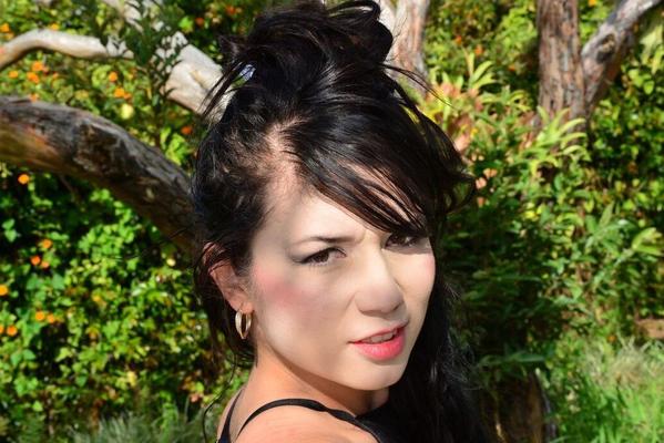 17P Sexy Colombian Teen poses in black lingerie while being outdoors