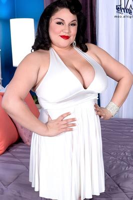 11P Fat girl Julia Juggs sports red lips while loosing her huge tits from a dress
