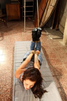 17P Distressed captive Adel hog tied & gagged fully clothed & helpless in basement