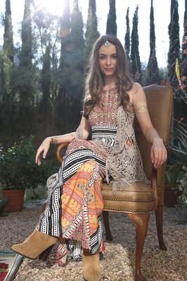17P Bohemian brunette beauty Tali Dova poses in her hippy gown in the garden