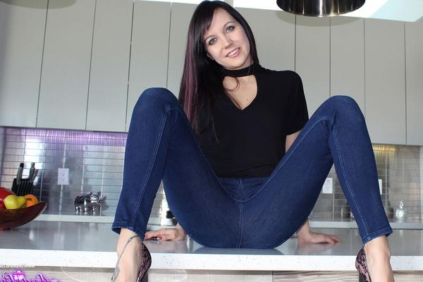 15P Nice young girl Andi Land removes her clothes in a tempting manner
