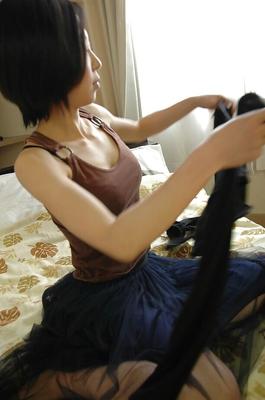 16P Smiley asian babe undresses and exposes her nipples and slit in close up