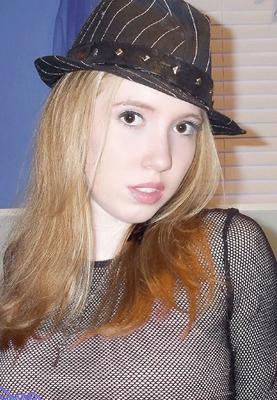 17P Shy redhead Nicki Blue posing in front of the camera in sexy lingerie