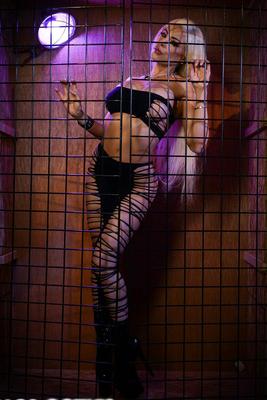 17P Attractive Latina Luna Star strips and shakes her hot booty in the cage