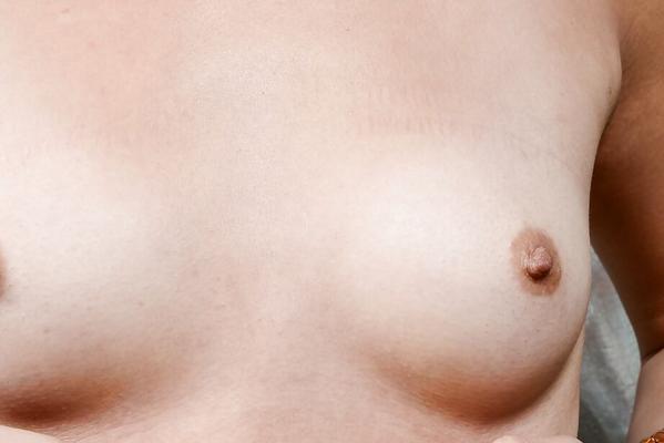 16P Slippy asian amateur strips down and exposes her shaved cunt in close up