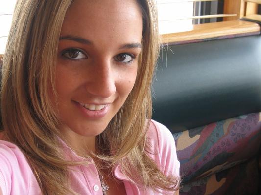 12P Amateur girl Nikki Sims flashes her bra while getting changed inside a vehicle
