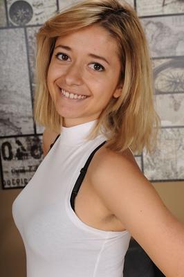 15P Cute amateur Izzy Bell flashes her pussy & disrobes to spread naked in a chair