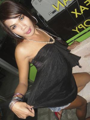 17P Young Thai ladyboy with hairy pubis demonstrates cock to curious tourist
