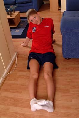 21P Soccer girl Kerry peels off her uniform & fingers her tight pussy up close