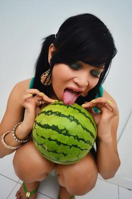 14P A Petite Asian shemale with Big Tits fucking a watermelon