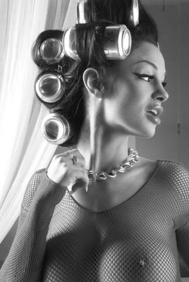 16P MILF Angelina Valentine in huge rollers & fishnet gives pierced pussy closeup