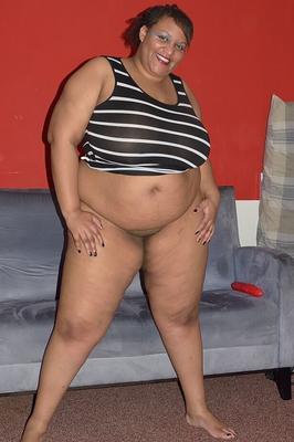 20P Obese black woman Curvy Bunny B oils up her tits before toying her vagina