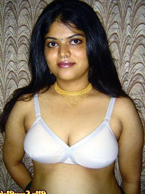 12P Chubby Indian girl Neha Nair lets her boobs spill forth from white bra