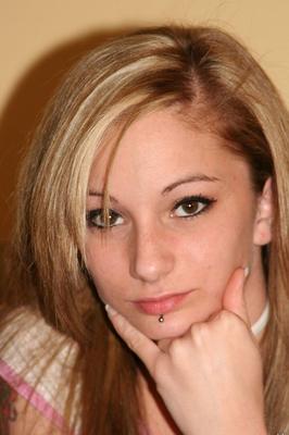 16P Pretty blonde amateur Leo with pierced lip flashes her naked boob