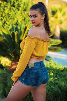 12P UK model Brook Wright sports red lips while uncovering her great tits