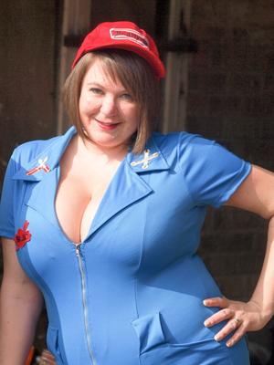 16P Overweight amateur Roxy bares her huge boobs and butt while working on a car