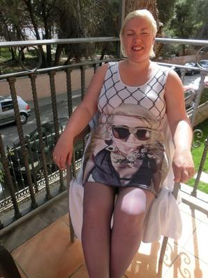 16P Older plumper Barby gets naked on her balcony as cars pass by below