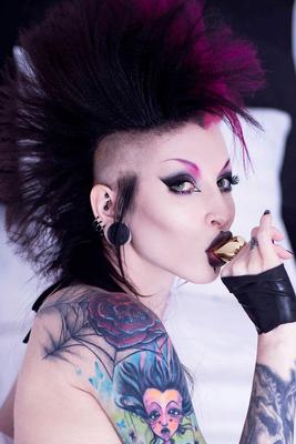 15P Alt girl Razor Candi sports a mohawk haircut with a butt plug in her asshole