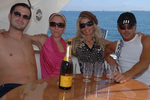 12P A bottle of downed wine leads to group sex action atop a boat at sea